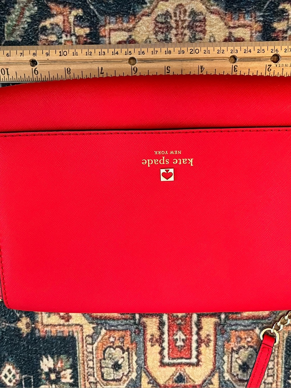kate spade red saffiano crossbody with gold logo